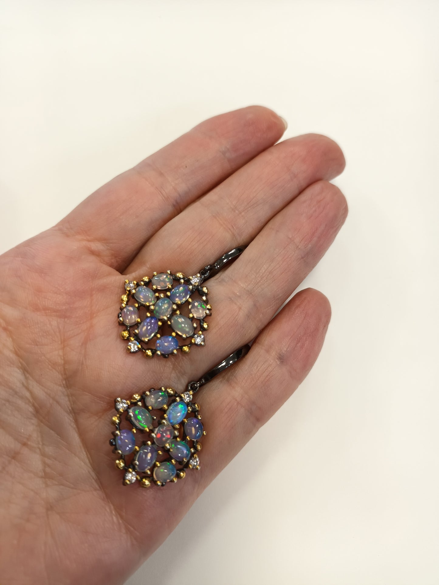 Earrings with rainbow opal and zircon
